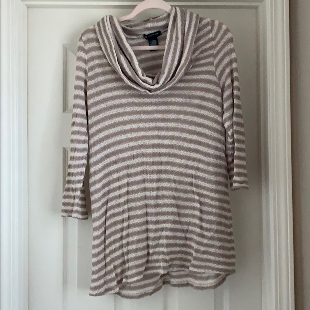 Soft cowl neck cold cream and tan sweater